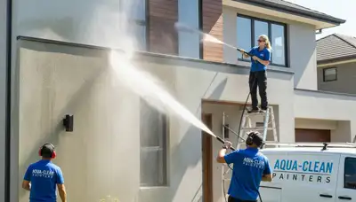 Professional pressure cleaning on stucco home exterior in San Diego, CA by expert painting contractors